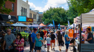People exploring the streets of downtown Blacksburg during a festival